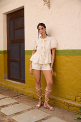 Off-White Peplum Top and Shorts Set