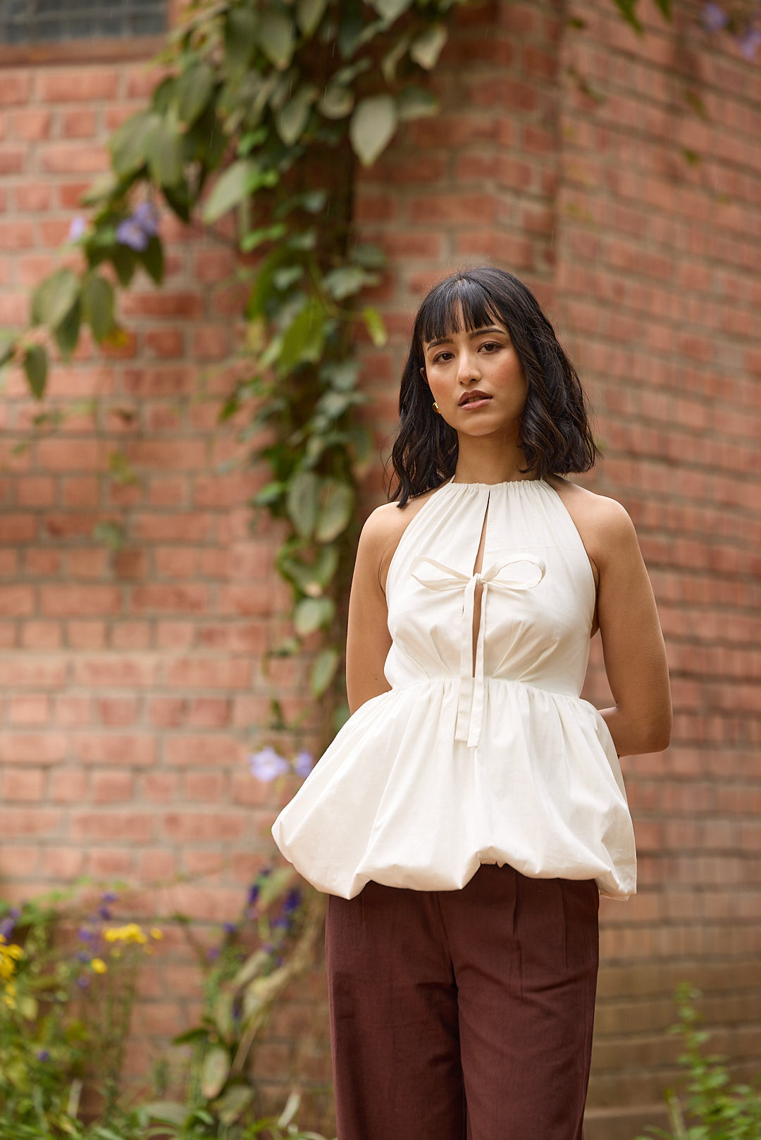 white bubble hem tops