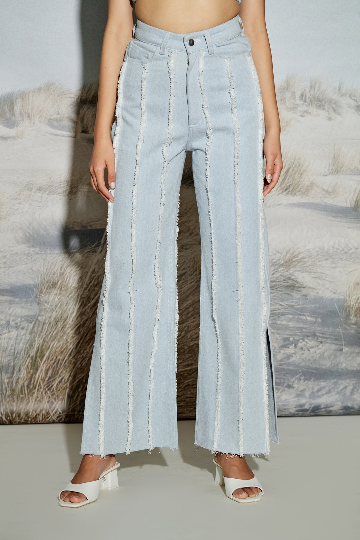 Paneled Denim Jeans with Raw Seams and Side Slit